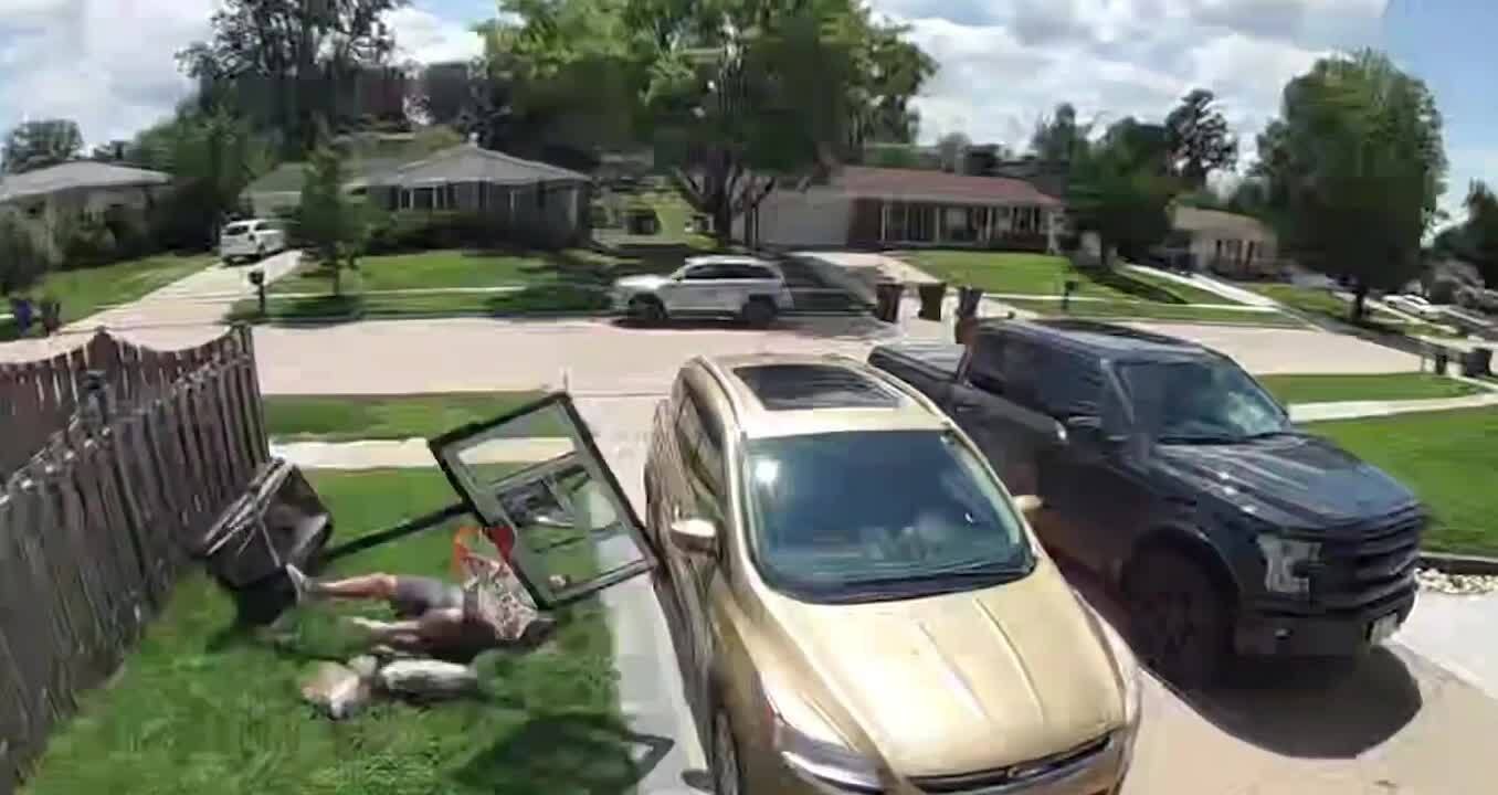 Man Falls While Lifting Basketball Hoop