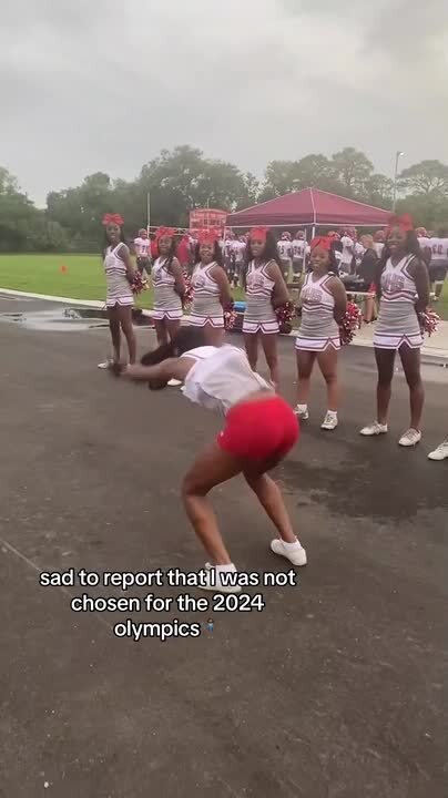 Wig Flies Away as Cheerleader Performs Handsprings