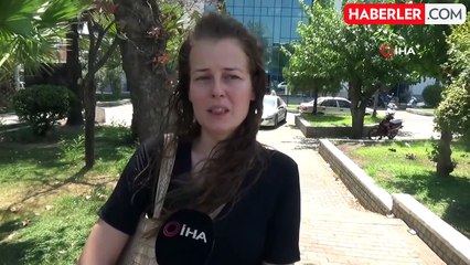 Hata yaptığı öne sürülen kadın memur iş yerine alınmayınca mesaisini kapının önünde tamamlıyor