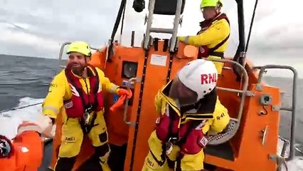 Bridlington Coastguard 'drop in' to deliver gift to RNLI team while out at sea