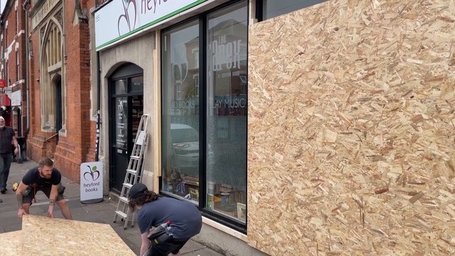 Properties are boarded up in Northampton as businesses brace for planned anti-immigration protest