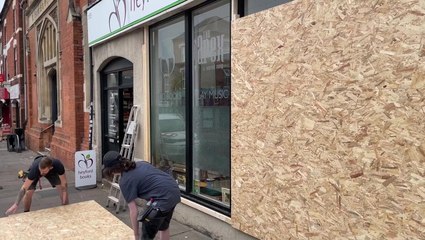 Shops boarded up as Northampton takes precautions against far-right riots