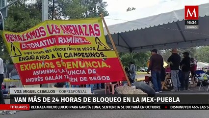 Tras más de 24 horas, continúa el bloqueo de ejidatarios en la autopista México - Puebla