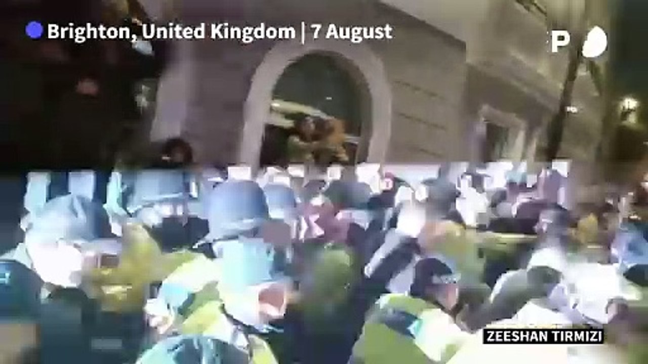 UK police escort anti-immigrant protesters away from Brighton counter-rally
