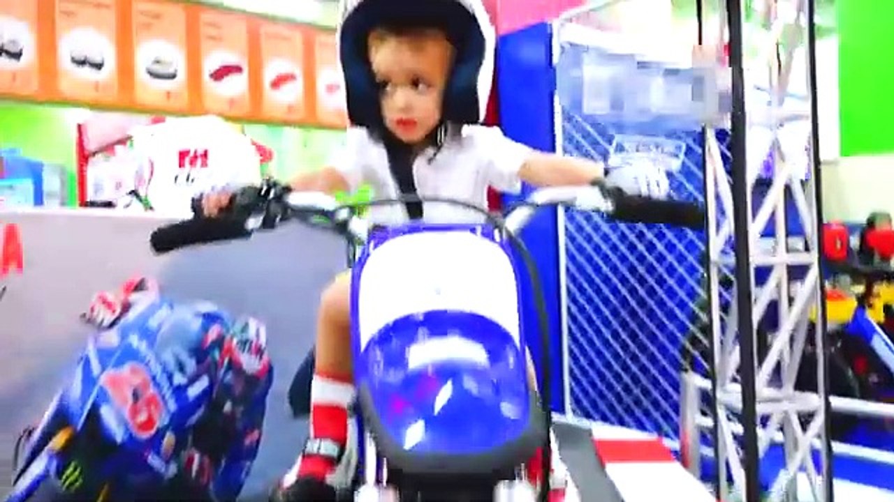 Vlad and mama play at the game center for children