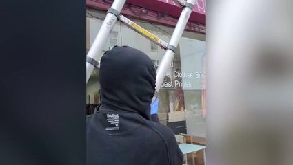 Watch moment new Banksy appears to be stolen by brazen thieves