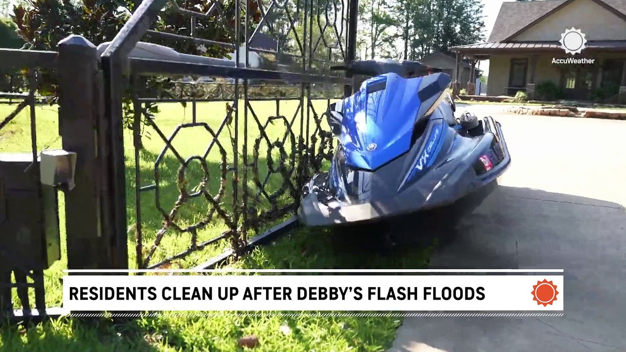 Residents clean up after Debby's flash floods