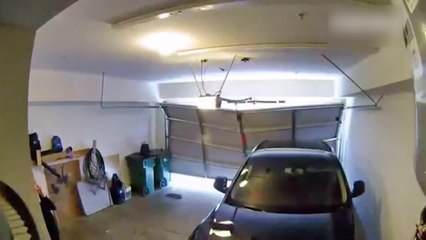 Garage Door Breaks Down Over Parked Car