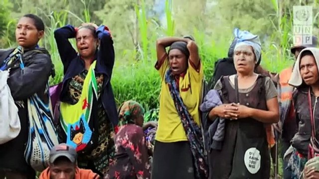 In the town cut off by a massive landslide in PNG, local walk over buried loved ones to transit essential goods