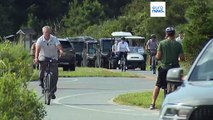 US President Joe Biden takes bike ride near beach house in Delaware