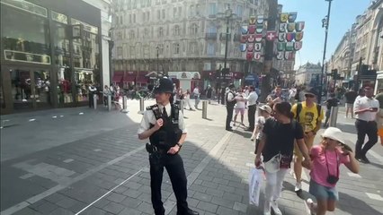 Man arrested after woman and girl stabbed in central London