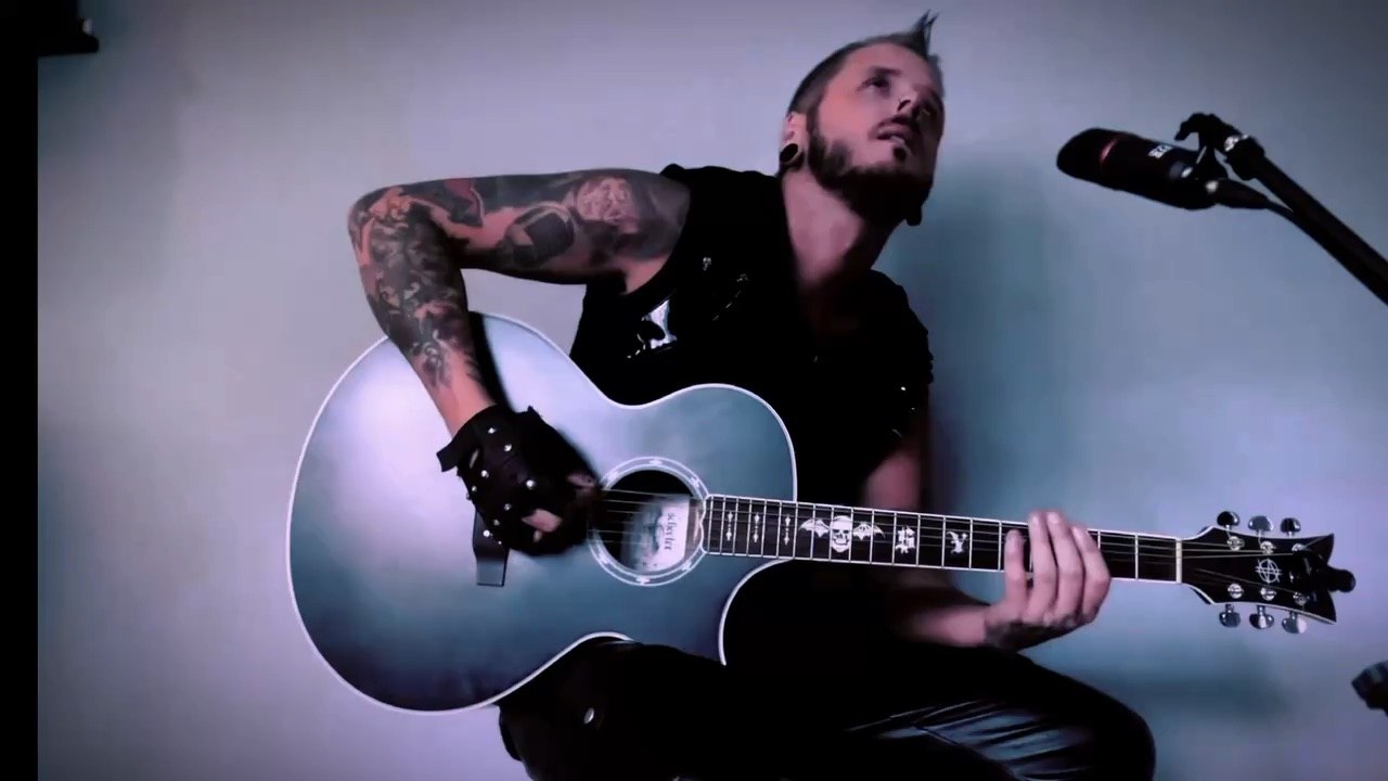 Denny Kidd of Sleeping In Silence channels Chris Motionless on tiktok acoustic cover.