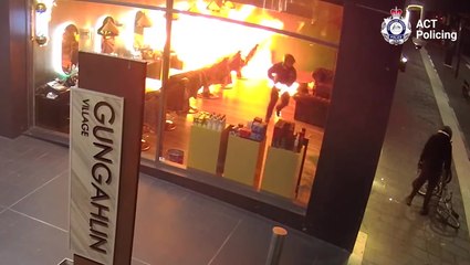 Watch moment suspected arsonist sets themselves on fire during barbershop attack