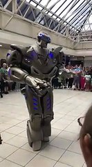 Robot singing a song with beautiful  kids