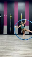 Woman Spins on Cyr Wheel