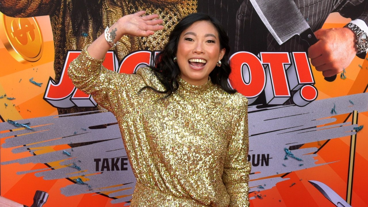 Awkwafina attends the red carpet world premiere of Jackpot!