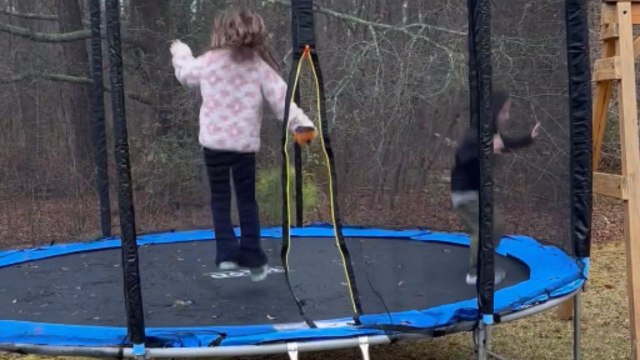 New trampoline surprise ends in comical fail as boy falls through bumper pad