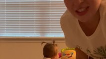 Mom uses selfie mode to inspire the baby girl to crawl and explore