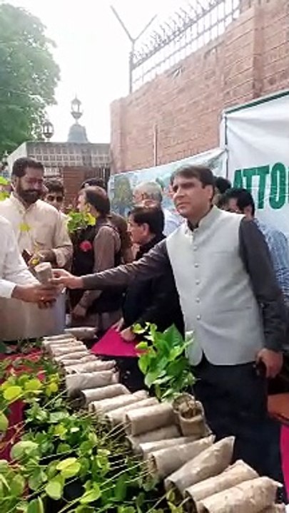 Attock Deputy Commissioner Rao Atif Raza and Sheikh Aftab Ahmed are distributing free saplings to the public