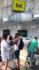 Angry passenger throws computer monitor at airline staff after missing flight