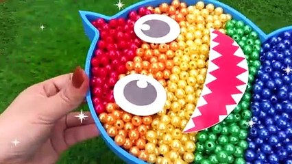 Mixing Rainbow beads in baby shark bathtub