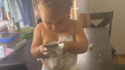 Adorable antics: Toddler covers himself in 'Neutrogena Sunscreen' while mom is distracted