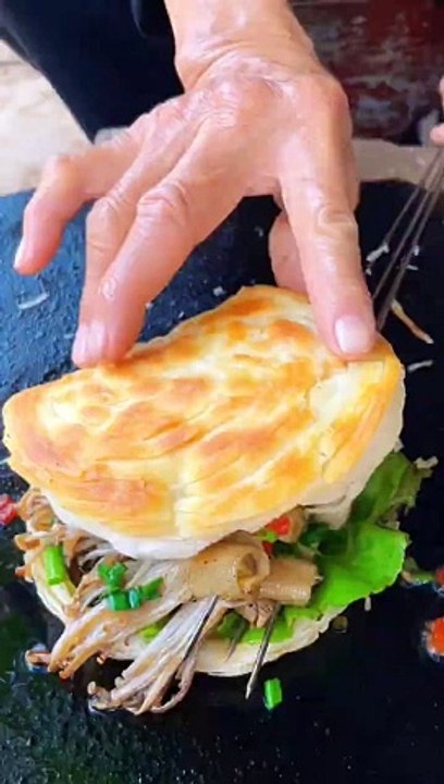 Chinese burger Grilled Enoki Mushrooms on Stone Plate
