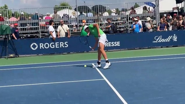 Arthur Cazaux warming up ground strokes before his match at the 2024 NBO in Montreal