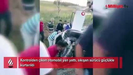 Kontrolden çıkan otomobil yan yattı, sıkışan sürücü güçlükle kurtarıldı