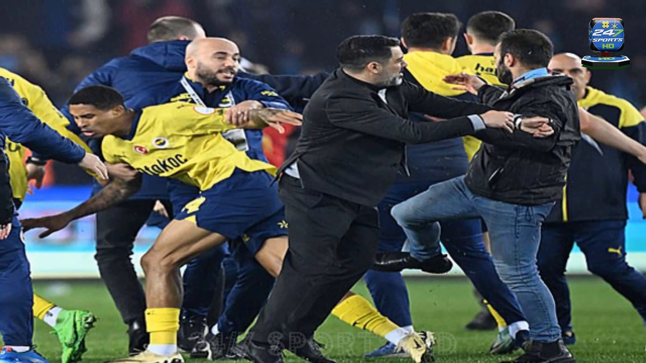 Fenerbahce president Ali Koc is attacked by a pitch invader and targeted by bottle-throwing fans as chaos erupts after draw with Goztepe