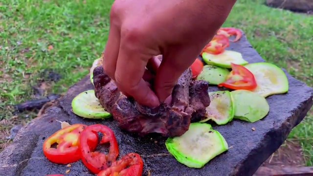 Outdoor Cooking Adventure- Grilling Meat on a Stone