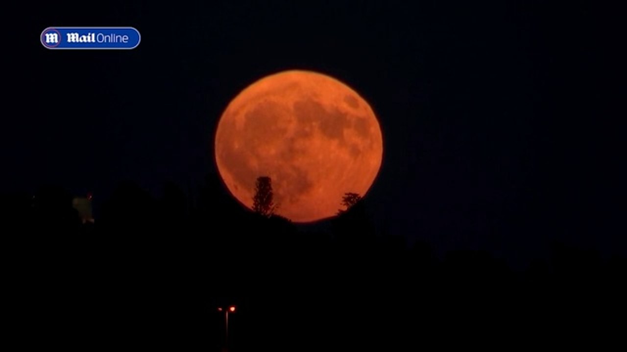Supermoon rises over Istanbul's Bosphorus Strait and Greece's temples