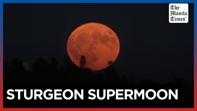 First supermoon of the year rises over Istanbul's Bosphorus Strait