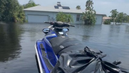 Heavy rain from Hurricane Debby submerges the streets in Sarasota, Florida