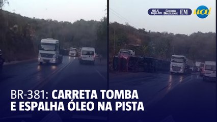 Carreta bi-trem tomba, espalha óleo na pista e fecha BR-381