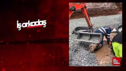 İş arkadaşını kepçeyle çamura attı