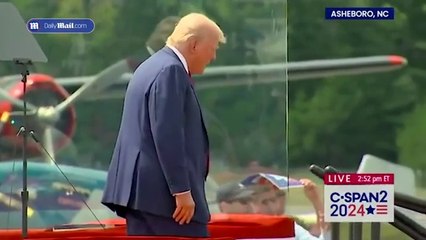 Trump leaves bulletproof glass to check on passed out supporter