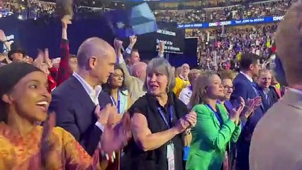 Minnesota Delegates at the DNC cheer on Sen. Amy Klobuchar's speech