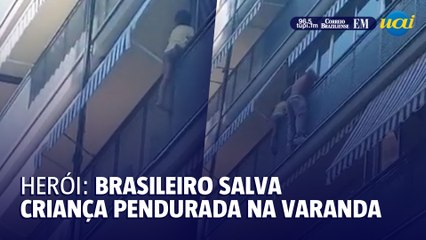 Brasileiro salva criança pendurada na varanda de prédio