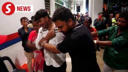 'Please save my mother,' says son of sinkhole victim