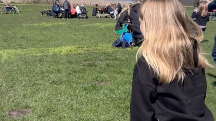 Enthusiastic girl's INSANE tumble fumble on wet grass will make you go 'YIKES!'