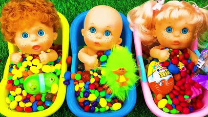 A fantastic video with candy mixed in three rainbow bathtubs magic skittles & ASMR slime cutting