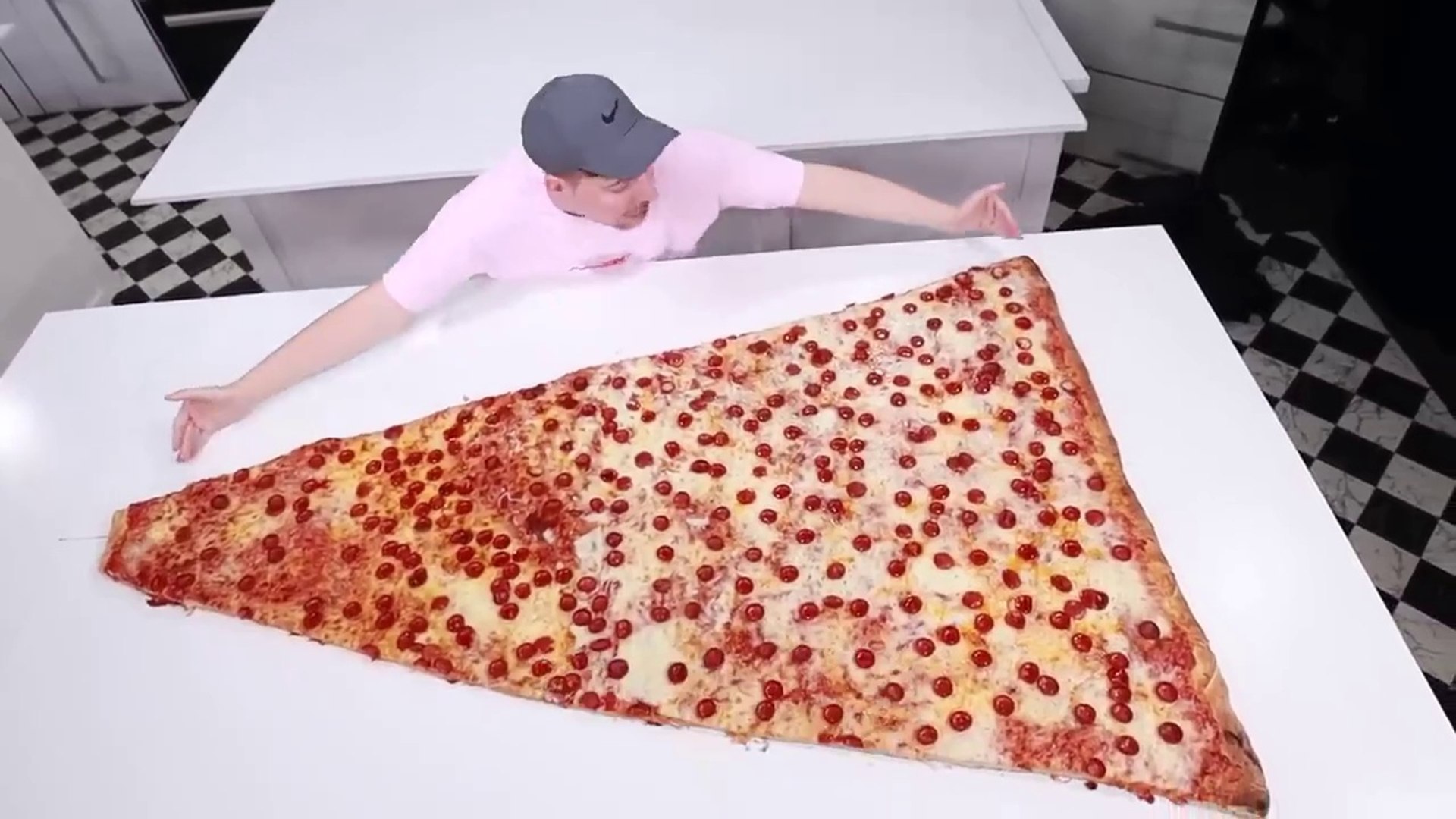 ⁣Mr Beast Ate The World’s Largest Slice Of Pizza