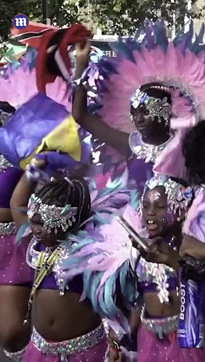 Colour and dancing on Children's Day Parade at Notting Hill Carnival