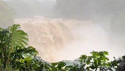 Tropical Storm Hone turns Hawaiian waterfall from trickle to torrent