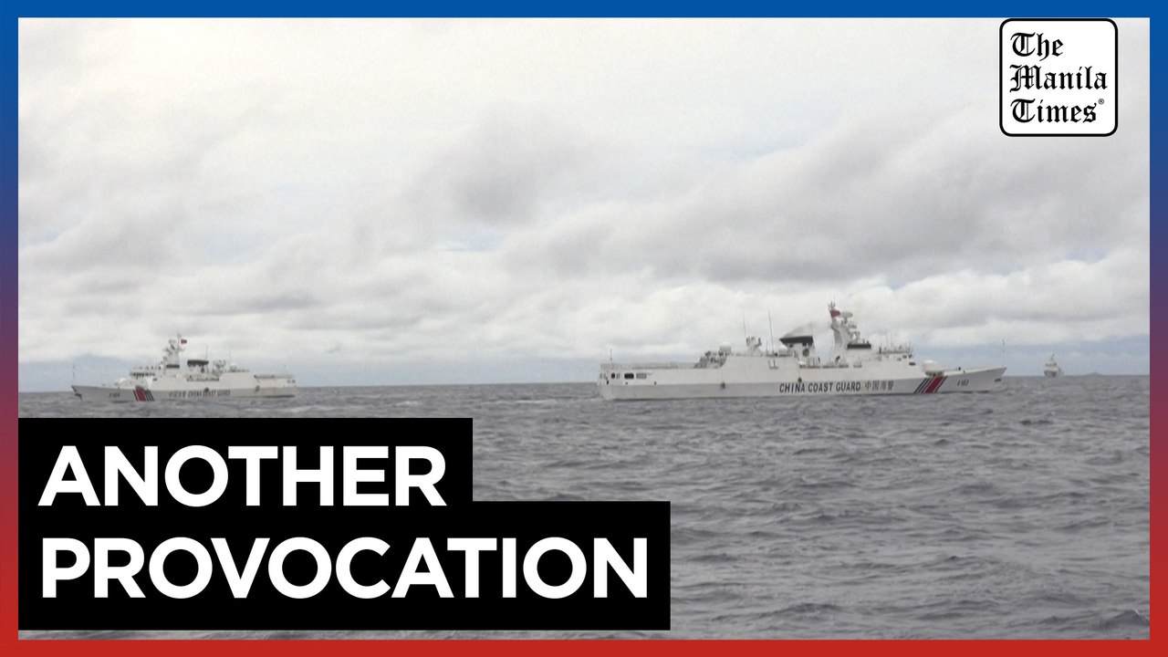 Chinese ships surround Philippine coast guard v...