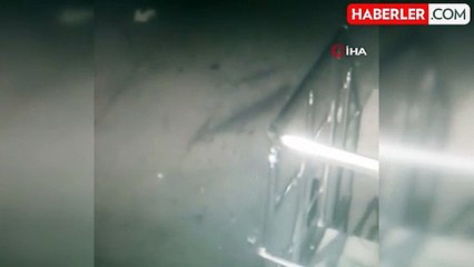 Havalandırma camından giren 'örümcek adam' 22 telefonu çaldı