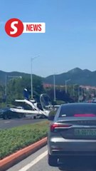 Light aircraft makes crash landing in China, pilot survives