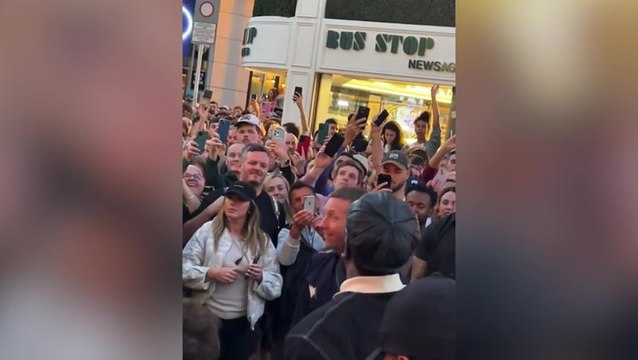 Coldplay, Burna Boy, and Little Simz busk on Dublin’s Grafton Street in surprise music video shoot