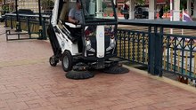 Street Vacuum cleaner being used in Pak Kret city in Thailand
